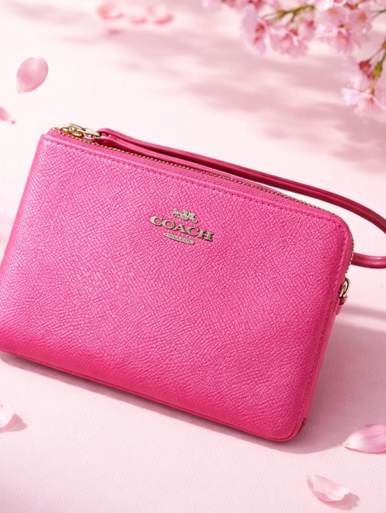 Coach Handbags - Coach Metallic Pink Wristlet